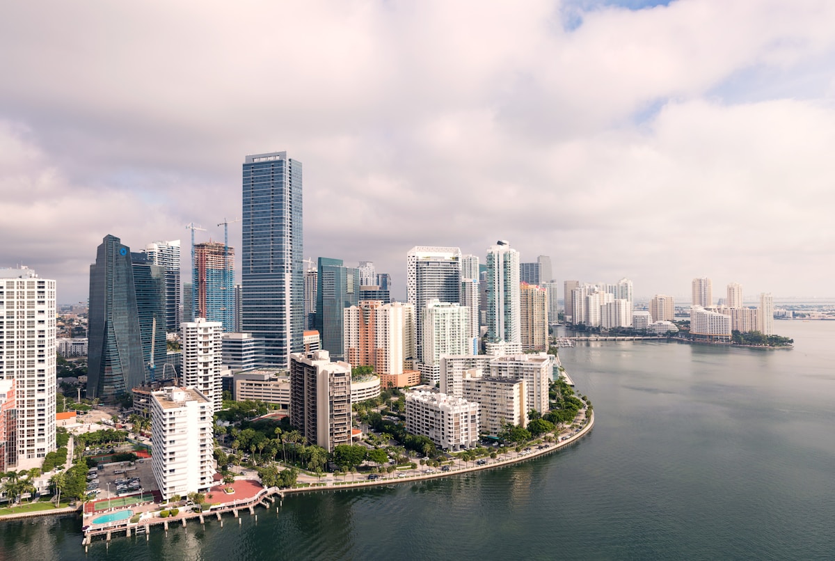 Aerial view of Brickell neighborhood in Miami with waterfront high-rise buildings